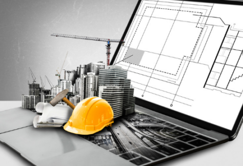 A laptop displaying architectural blueprints on the screen, with 3D elements emerging from the keyboard including buildings, a construction crane, a hard hat, blueprints, and a measuring tool—symbolizing engineering and construction planning through technology.