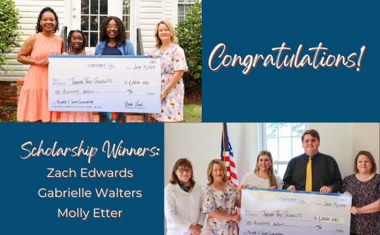 Picture of students who are being awarded scholarships holding a big check