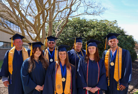 Students in there graduation caps and gowns