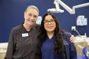 BV4A9443 Instructor and student standing in the dental office